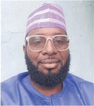 Highly recognizably Nigerian man wearing glasses and traditional cap, representing Nigerian Hall of Fame contributors and notable personalities in Nigeria.