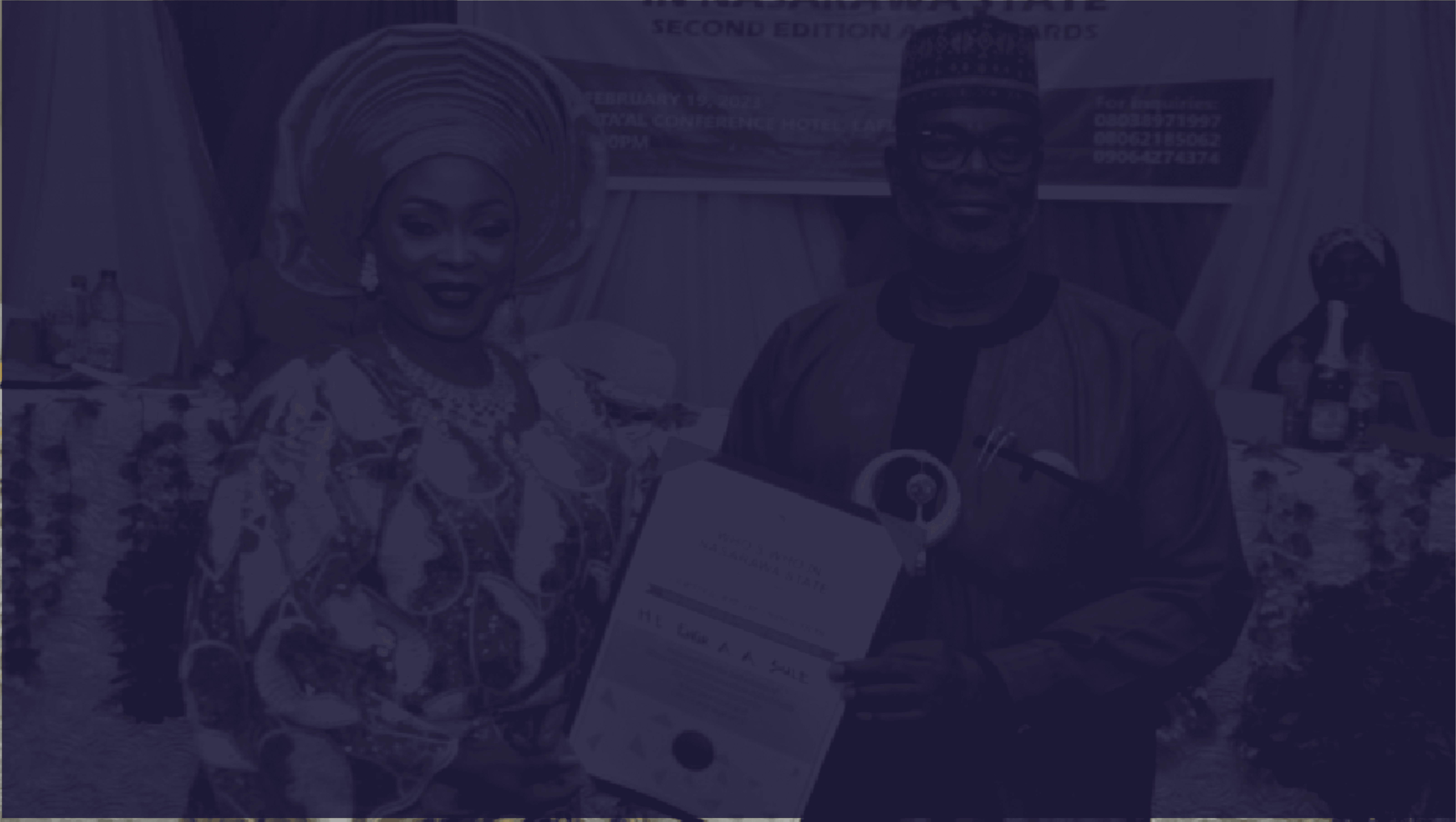 Elegant Nigerian woman receiving award at Who's Who in Nigeria Hall of Fame event, showcasing recognition of distinguished achievements in Nigeria.